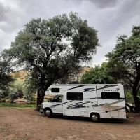 Majestic Enchantment Fly Fishing Camp headquarters ico