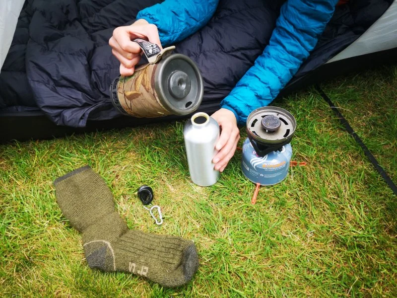 How to Use Campfire Heat to Keep Warm Overnight in the Wild