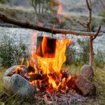 How to Build a Safe Cooking Fire at Your Campsite Without Risk