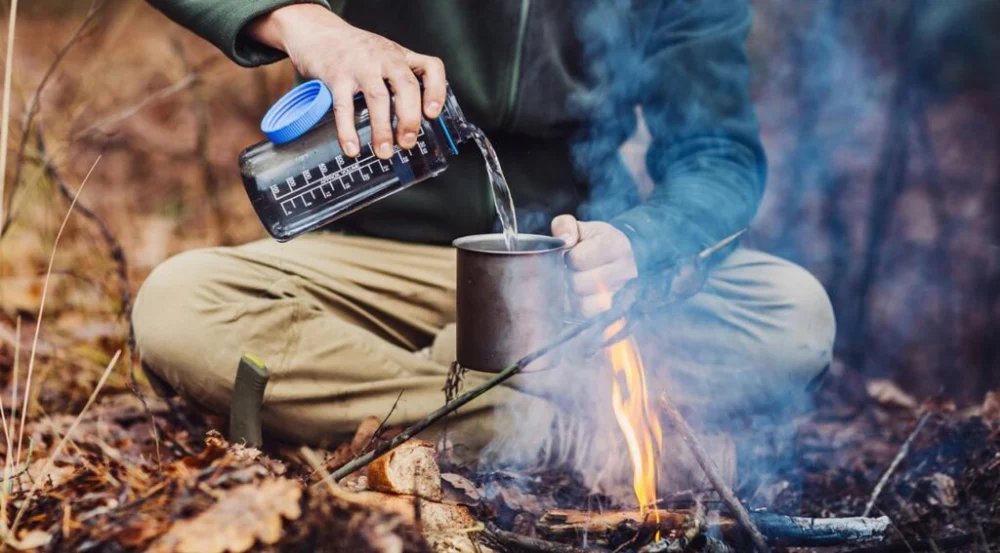 How to Use Campfire Heat to Purify Water in the Wilderness