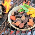How to Use Campfire Smoke to Preserve Meat Safely in the Wild
