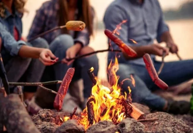 How to Cook Burgers and Hot Dogs Over a Campfire