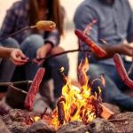 How to Cook Burgers and Hot Dogs Over a Campfire