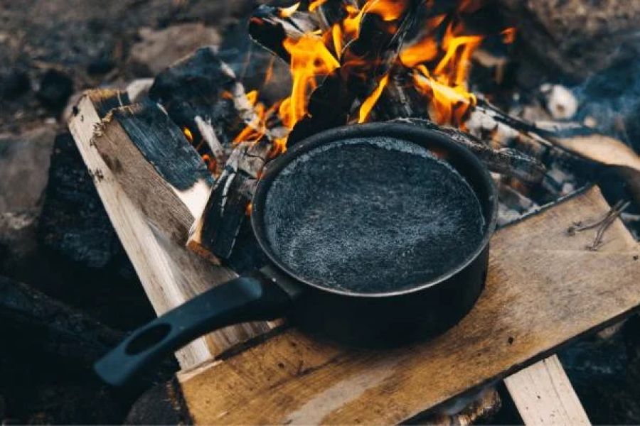 How to Use a Campfire to Boil Water Safely in the Wilderness