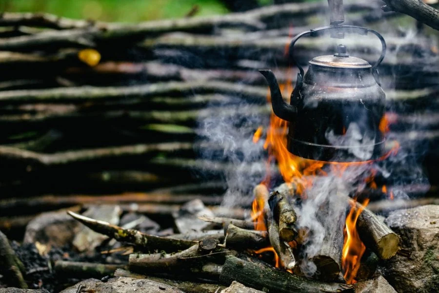 How to Use Campfire Heat to Boil Water Safely While Camping