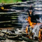 How to Use Campfire Heat to Boil Water Safely While Camping