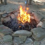 How to Build a Campfire That Minimizes Smoke and Burns Clean