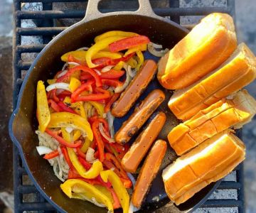 How to Cook Burgers and Hot Dogs Over a Campfire: Complete Outdoor Guide