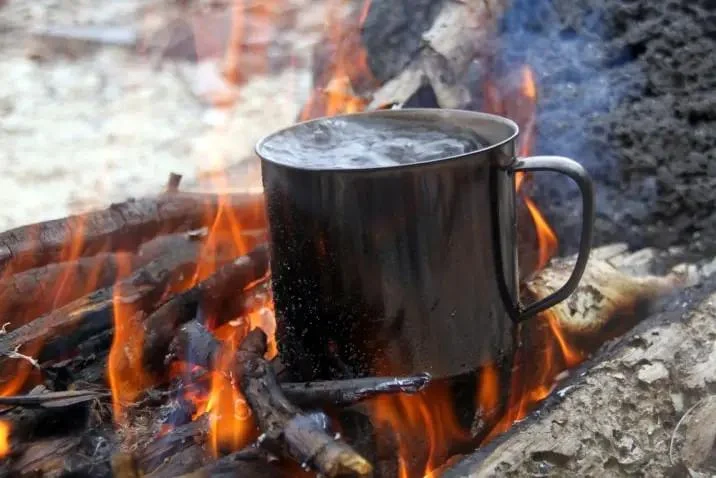 How to Use Campfire Heat to Warm Up Water Bottles Safely