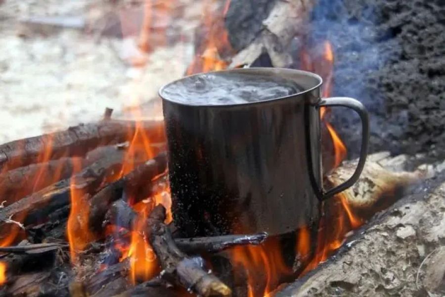 How to Use Campfire Heat to Warm Up Water Bottles Safely