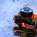 How to Use Campfire Heat to Melt Snow for Water