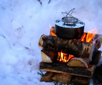 How to Use Campfire Heat to Melt Snow for Water