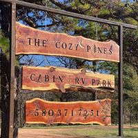 The Cozy Pines Cabin & RV Park ico