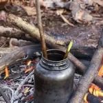 How to Use Campfire Heat to Warm Up Water Bottles