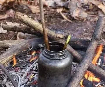 How to Use Campfire Heat to Warm Up Water Bottles