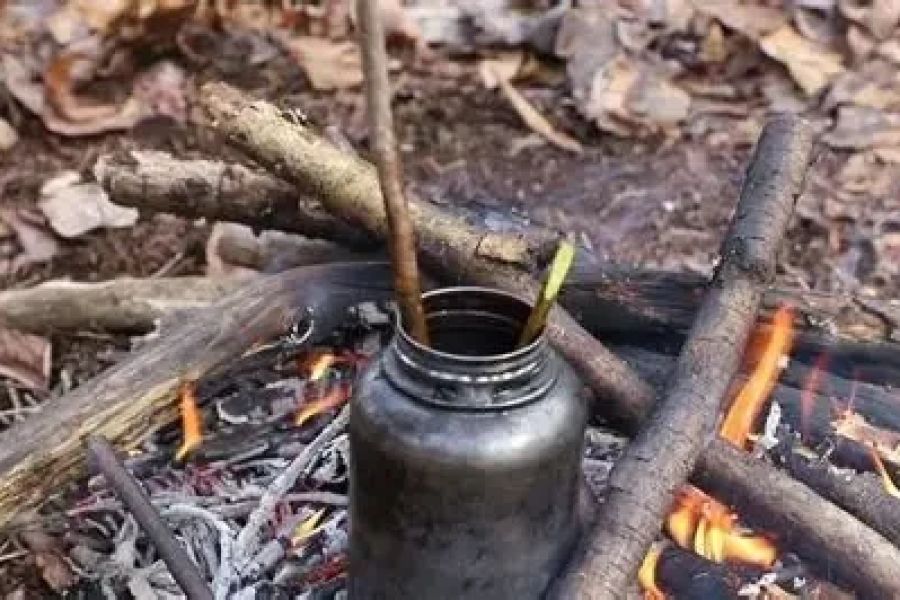 How to Use Campfire Heat to Warm Up Water Bottles