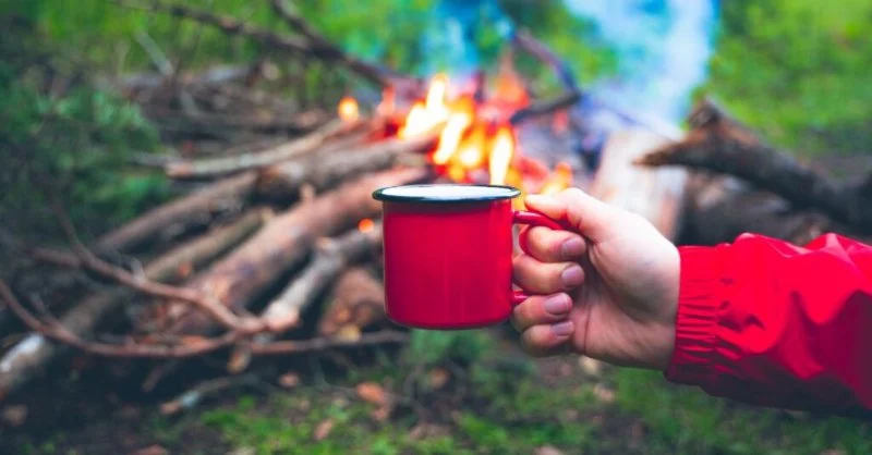 How to Use a Campfire to Heat Water for Tea and Coffee