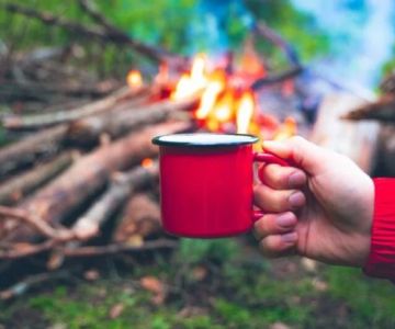 How to Use a Campfire to Heat Water for Tea and Coffee