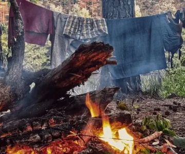 How to Dry Clothes Using Campfire Heat – Essential Camping Tips
