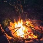 How to Use Campfire Heat to Dry Firewood Effectively and Safely