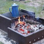 How to Light and Maintain a Safe Campfire in a Designated Site