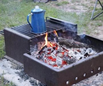 How to Light and Maintain a Safe Campfire in a Designated Site
