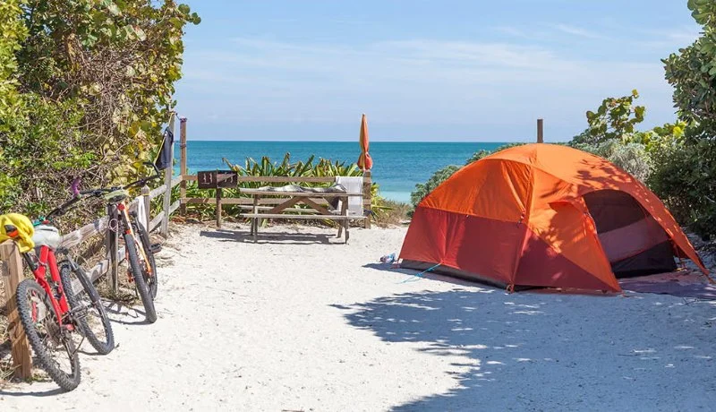 How to Camp Near the Coast Without Getting Sand Everywhere