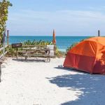 How to Camp Near the Coast Without Getting Sand Everywhere