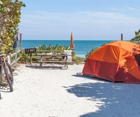 How to Camp Near the Coast Without Getting Sand Everywhere