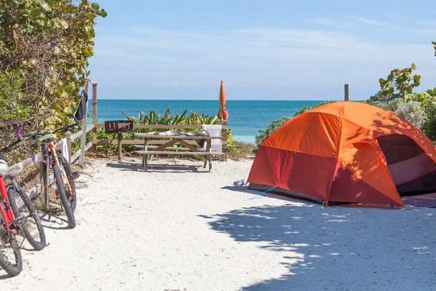 How to Camp Near the Coast Without Getting Sand Everywhere